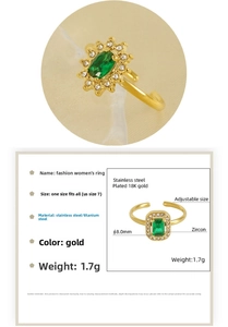 Detail of adjustable 18k gold plated ring with green zircon and white diamonds