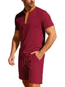Detail view of burgundy waffle knit texture on men polo shirt and shorts casual set