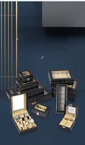 Detail of premium PU leather watch boxes with transparent lids and velvet interior cushions