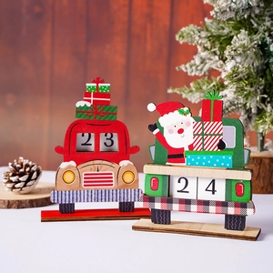 Detail of red and green wooden Christmas truck advent calendars with gift boxes