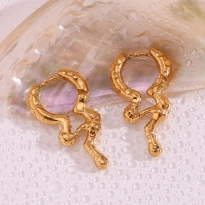 Macro shot of 18K gold plated liquid-style irregular hoop earrings with water drops