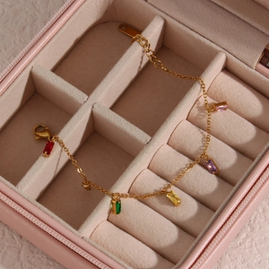 Golden titanium steel bracelet featuring multi-colored rectangular zircon gemstones