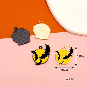 Detailed view of bat and moon Halloween pendant with dimensions 23mm by 21mm