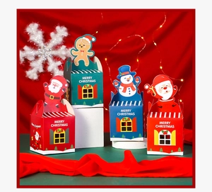 Close-up of festive Christmas gift boxes with Santa and Snowman 3D decorations