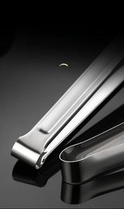 Macro view of integrated molding and thickened stainless steel food tongs design