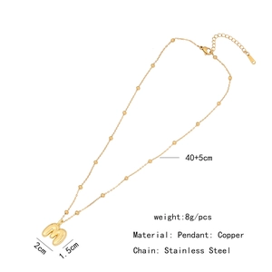 Golden bubble letter M necklace size 2cm x 1.5cm with 45cm stainless steel beaded chain