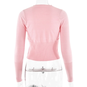 Back view of a slim fit pink knit cardigan featuring ribbed cuffs and a narrow waist design
