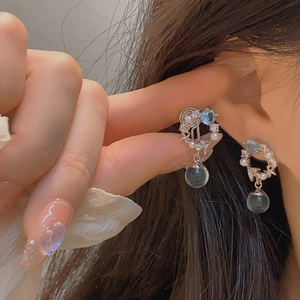 French style silver earrings with blue zircon mermaid tail and water drop pearls on model