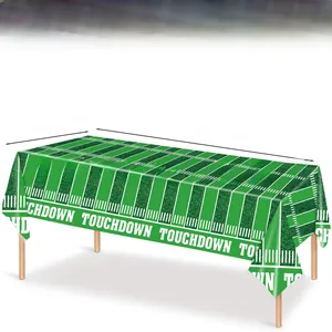 Detail of disposable football field tablecloth with touchdown text and yard lines