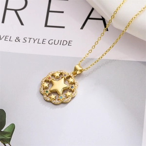 Detailed view of gold star pendant necklace with multi-colored zircon stones and cross chain