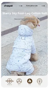 Close-up of winter dog coat with starry prints, integrated harness D-ring and warm hood