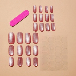 Pink cat eye press-on nails set with glitter square round tips and manicure tools