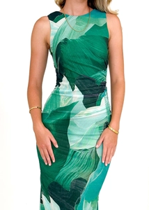Detail of ruched waist design on a slim-fit green floral sleeveless summer dress