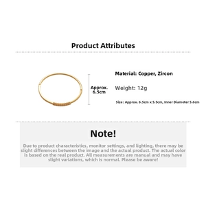 Detail showing 18k gold plated bracelet dimensions 5.6cm inner diameter and weight 12g
