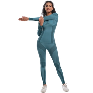 Detailed texture of seamless blue yoga set featuring breathable zones and ribbed compression