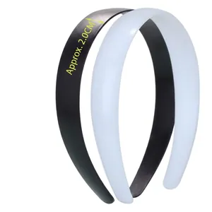 Detail view of 2.0cm wide black and white plastic DIY headbands with smooth surface