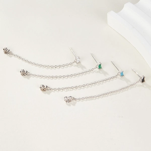 Close-up of S925 silver tassel earrings with white, green, blue and black square zircons