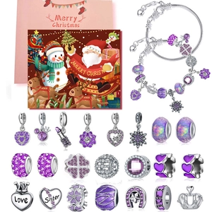 DIY Christmas advent calendar set with purple charms, silver snake chains and gift bags