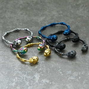 Retro punk skull bracelets in silver, gold, rainbow, blue, and black titanium steel