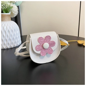 Detailed macro view of white PU leather flower bag with pink glitter petal decoration