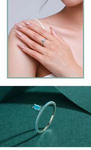 Detailed view of S925 silver crown ring with bohemian turquoise inlays and oval center stone