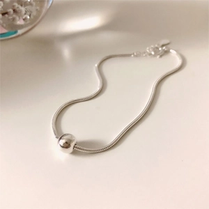 Minimalist S925 sterling silver snake chain bracelet with a single polished round bead