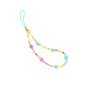 Detail of colorful handmade flower beaded phone charm with turquoise wrist strap loop
