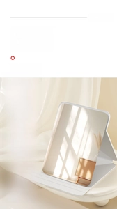 Detail of white foldable makeup mirror with three adjustable angles and anti-slip lining