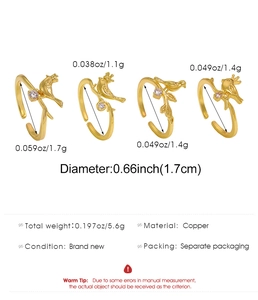 Detailed view of four-piece vintage hummingbird ring set with weight and size specs