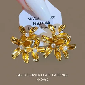 French vintage floral stud earrings with pearls and gold plated silver finish