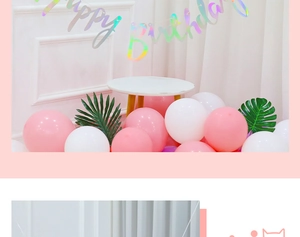 Pastel rainbow Happy Birthday banner set with pink and white balloons and green leaf decor