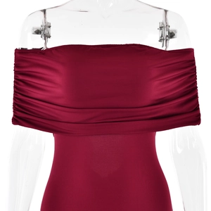 Detail of burgundy tube dress featuring elegant pleated chest design and slim fit fabric