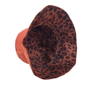 Dual-sided leopard print bucket hat in brick red, stylish outdoor sun protection headwear