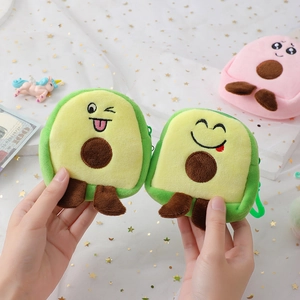 Cute plush avocado coin purse with zipper and clip shown against a starry mesh background