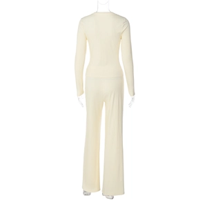 Rear view of cream ribbed knit long sleeve cardigan and wide leg pants set