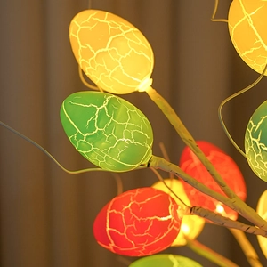 Detailed macro view of the LED Easter egg tree light showing glowing cracked texture details