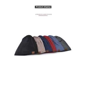 Detail view of six classic knitted beanies with premium leather F&S logo patches