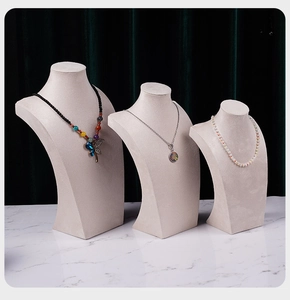 Professional velvet jewelry display busts in cream gray for necklace showcase and photography