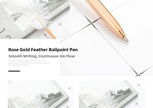 Detailed macro view of elegant rose gold quill ballpoint pen with soft white feathers