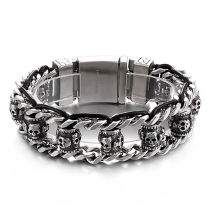Vintage braided leather bracelet with stainless steel skull and punk chain elements