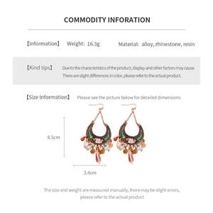 Detailed size and weight specs of Bohemian moon tassel earrings with rhinestones