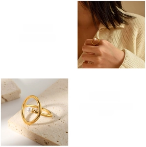 Detailed view of an oval 18k gold-plated stainless steel ring with a central pearl inlay
