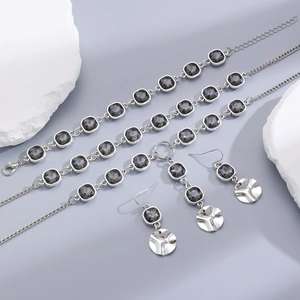 Detailed set of silver necklaces and earrings with grey square acrylic stones