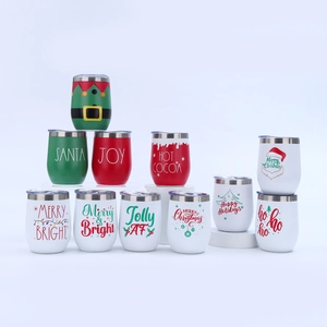 Pyramid stack of 12oz stainless steel egg tumblers with various Christmas patterns