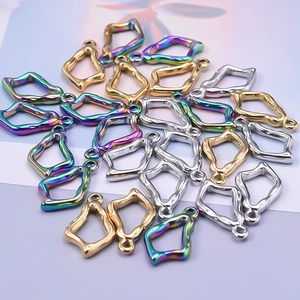 Close-up of irregular 304 stainless steel pendants in gold, silver and rainbow colors