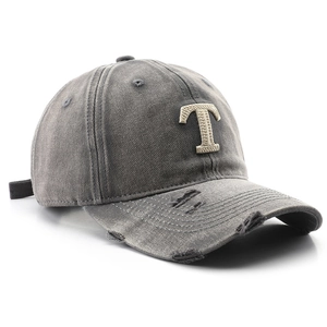 Washed dark grey baseball cap with towel-embroidered letter T and distressed details