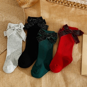 Spanish style knee high socks for children with large sequin bows in four classic colors