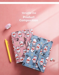 Detail of cute lucky cat fabric journal covers in pink and blue with snap closure