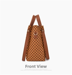 Detailed side view of vintage print handbag set with geometric pattern and top handles