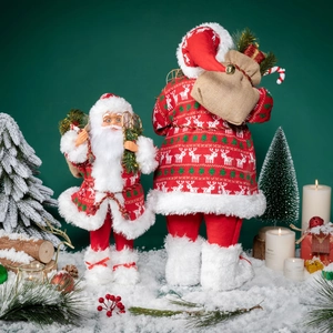 Classic Santa Claus figurines with backpack in red and white on decorative snowy background